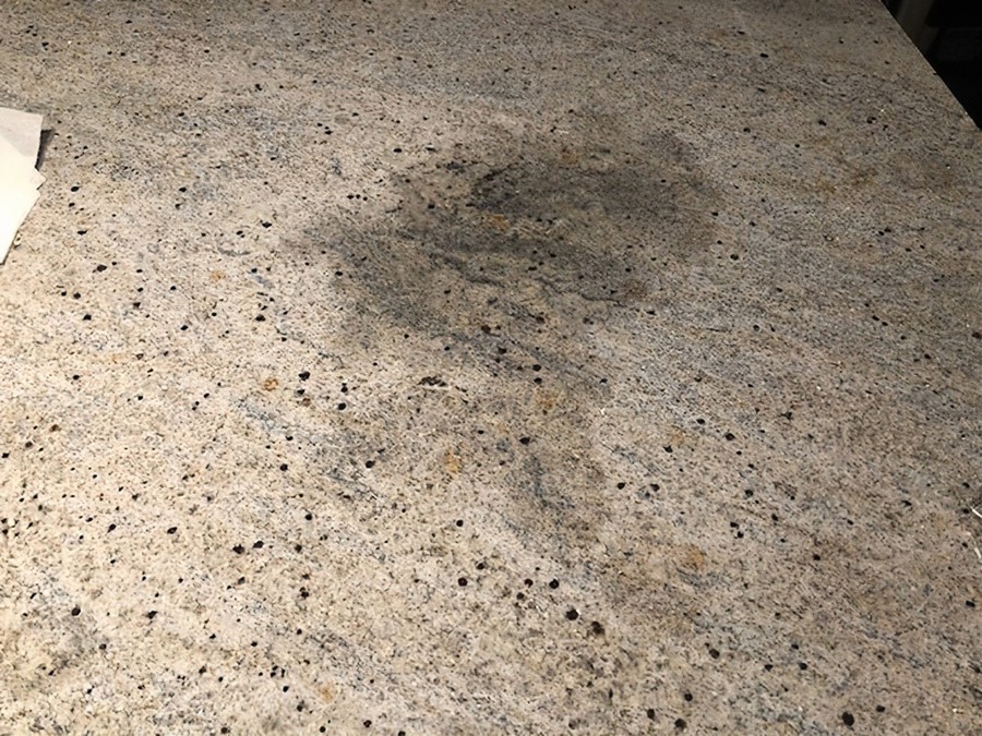White Granite Flooring with Water Stains